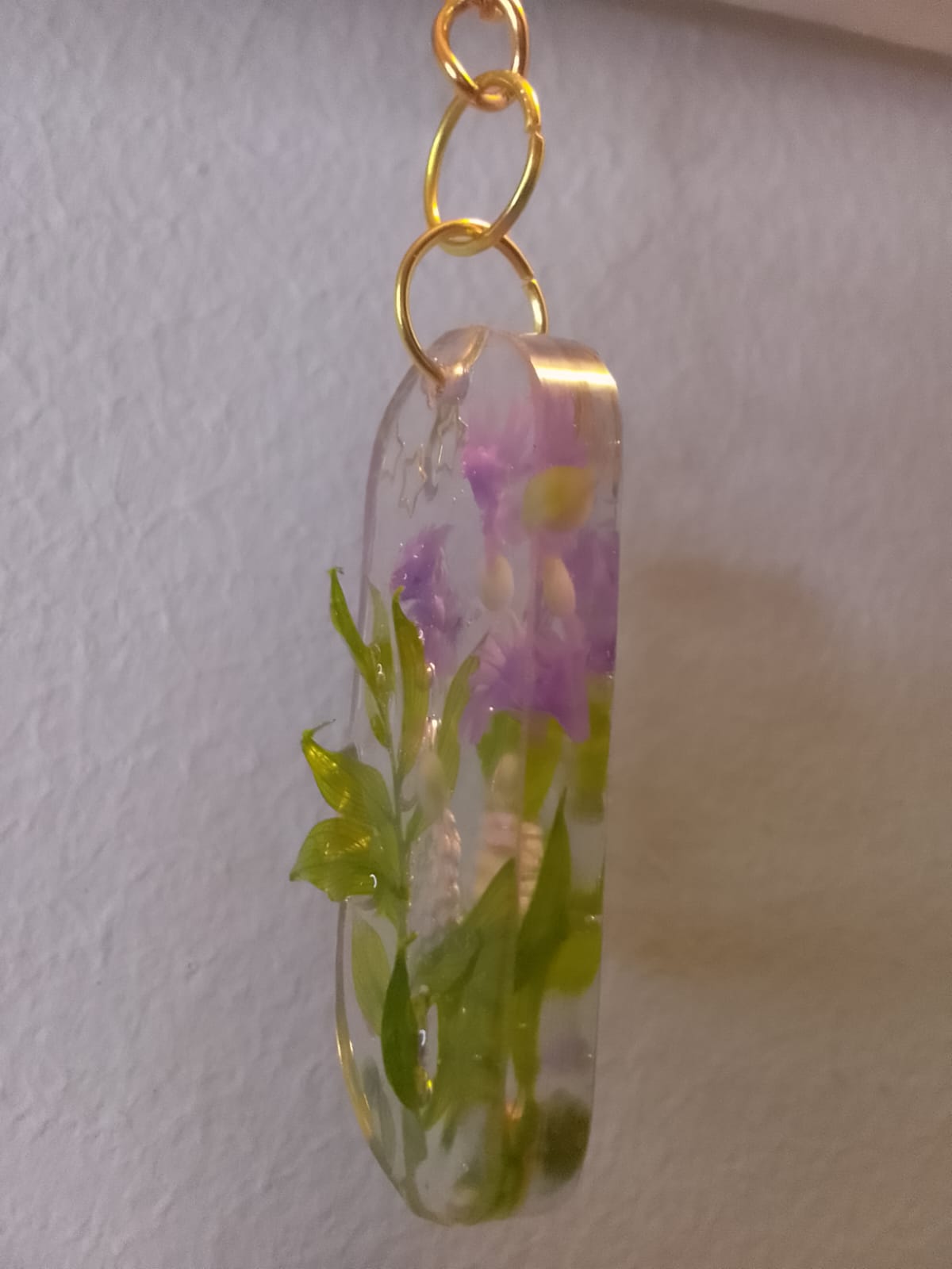 Portachiavi da donna in resina trasparente con decorazioni floreali