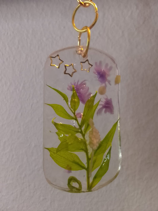 Portachiavi da donna in resina trasparente con decorazioni floreali